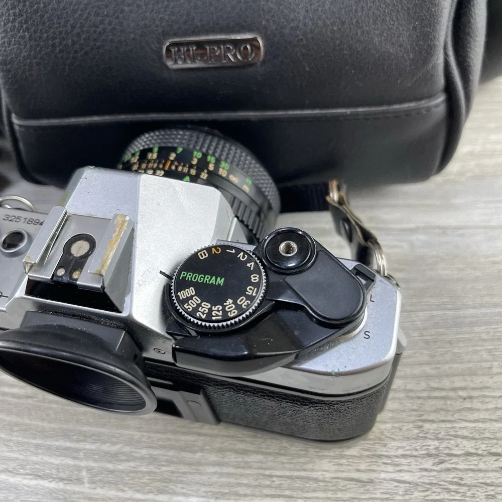 Canon AE-1 35mm SLR Film Camera w/ 50mm f/1.4 FD Lens